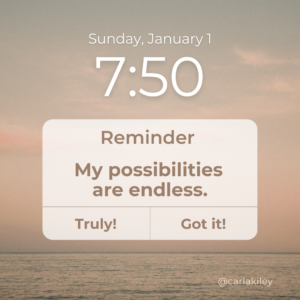 An image of a phone reminder with a sunset that says, "My possibilities are endless."