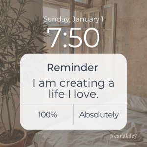 Image of a phone reminder that says, "I am creating a life I love."