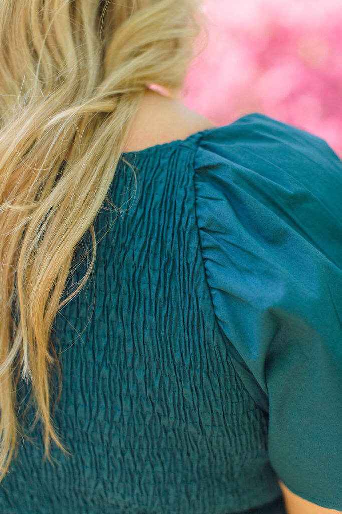 Up-close picture of the Angela dress smocked back